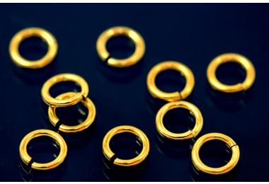 Jump rings round open approx. size outside  4,5mm, wire thickness 0,8mm, 925/- Silver gold plated