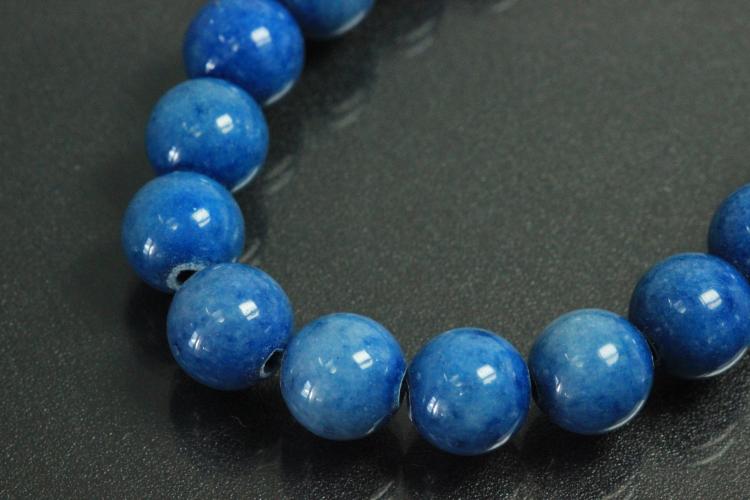 Blue Agate spherical gemstone strand blue dyed, approx. dimensions  8mm, approx. 39,0 - 40,0cm long.