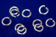 Jump rings round open approx. size outside  4,5mm, wire thickness 0,8mm, 925/- Silver