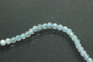Aquamarine faceted spherical gemstone strand light blue, approx. dimensions  2mm, approx. 40.0cm long.