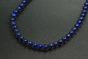 Lapis Lazuli spherical gemstone strand blue, approx. dimensions  4mm, approx. 39,5cm long. Quality feature A. This gemstone strand was provisionally strung on blue pearl silk for further processing.