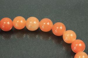 Red Aventurin spherical gemstone strand, approx. dimensions  8mm, approx. 39,0 - 40,0cm long.