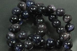 Blue sand stone spherical gemstone strand, approx. dimensions  8mm, approx. 39,0 - 40,0cm long.