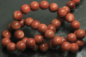 Gold sand stone spherical gemstone strand, approx. dimensions  8mm, approx. 39,0 - 40,0cm long.