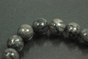 Picasso jasper dark spherical gemstone strand, approx. dimensions  8mm, approx. 39,0 - 40,0cm long.