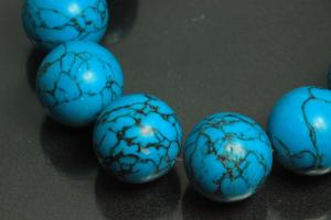 Turquoise reconstructed spherical gemstone strand, approx. dimensions  20mm, approx. 39,0 - 40,0cm long.