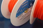 10m rubber cord on spool, orange-red, Ø3mm